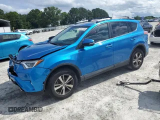 2016 Toyota RAV4 XLE with VIN 2T3RFREV5GW487166, listed as a Copart auction lot 60313135 with 110,335 mi miles and Salvage title. Bid and sale history available at DreamBid. Image 1.