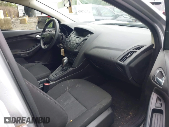 2016 Ford Focus SE z VIN 1FADP3F29GL353908, wystawiony jako IAAI lot #42289308 z przebiegiem 94 937 mil mil oraz . Historia ofert i sprzedaży dostępna na DreamBid. Obrazek 5.