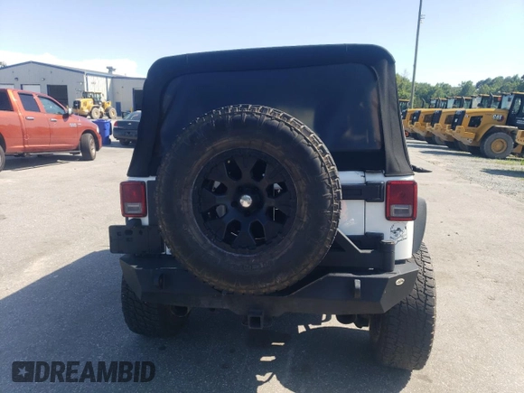 2014 Jeep Wrangler Unlimited Rubicon with VIN 1C4BJWFG4EL325544, listed as a Copart auction lot 61966025 with 149,162 mi miles and Salvage title. Bid and sale history available at DreamBid. Image 6.