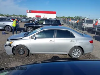 2013 Toyota Corolla L with VIN 5YFBU4EE7DP166021, listed as a IAAI auction lot 42027062 with 179,107 mi miles and . Bid and sale history available at DreamBid. Image 14.