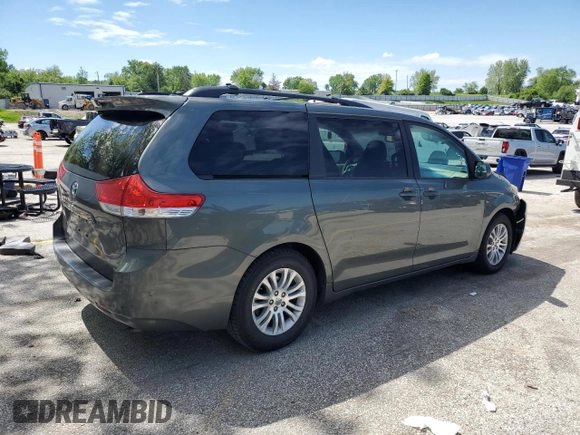 2014 Toyota Sienna XLE with VIN 5TDYK3DC1ES453924, listed as a Copart auction lot 56148565 with 198,185 mi miles and Clean title. Bid and sale history available at DreamBid. Image 3.