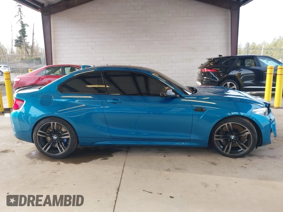 2018 BMW M2 z VIN WBS1J5C59JVA12718, wystawiony jako IAAI lot #41796602 z przebiegiem 53 707 mil mil oraz . Historia ofert i sprzedaży dostępna na DreamBid. Obrazek 14.