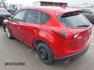 2015 Mazda CX-5 Grand Touring with VIN JM3KE4DY1F0540586, listed as a IAAI auction lot 41710216 with 148,800 mi miles. Bid and sale history available at carsss.com. Image 3.