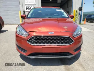 2018 Ford Focus SE z VIN 1FADP3F2XJL254750, wystawiony jako Copart lot #61907545 z przebiegiem 71 328 mil mil oraz Szkoda całkowita • Salvage title. Historia ofert i sprzedaży dostępna na DreamBid. Obrazek 5.