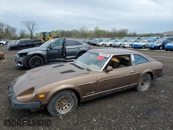 1979 Datsun 280ZX z VIN HGS130115983, wystawiony jako Copart lot #54709755 z przebiegiem 74 026 mil mil oraz Tytuł czysty. Historia ofert i sprzedaży dostępna na DreamBid. Obrazek 1.