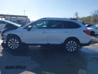 2019 Subaru Outback Touring with VIN 4S4BSATC4K3340084, listed as a IAAI auction lot 41204749 with 49,852 mi miles and . Bid and sale history available at DreamBid. Image 15.