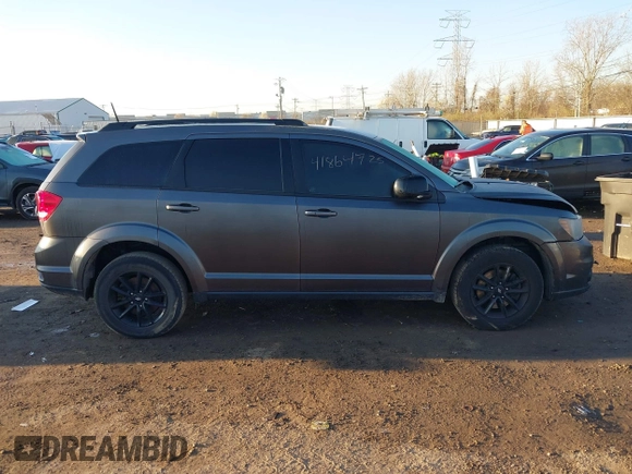 2019 Dodge Journey SE with VIN 3C4PDCBB2KT873970, listed as a IAAI auction lot 41864725 with 91,240 mi miles and . Bid and sale history available at DreamBid. Image 13.
