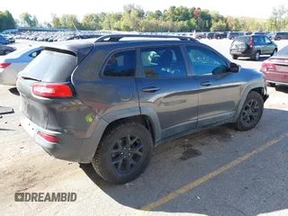 2014 Jeep Cherokee Trailhawk with VIN 1C4PJMBB0EW237741, listed as a IAAI auction lot 40505251 with 139,883 mi miles and . Bid and sale history available at DreamBid. Image 4.