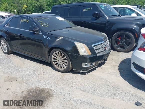 2011 Cadillac CTS Premium with VIN 1G6DS5ED4B0105859, listed as a IAAI auction lot 42494741 with 143,128 mi miles and . Bid and sale history available at DreamBid. Image 6.