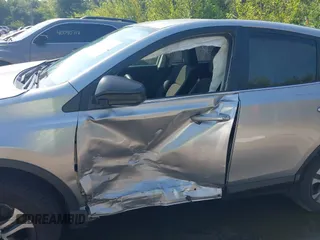 2018 Toyota RAV4 LE with VIN JTMZFREV3JJ161811, listed as a IAAI auction lot 40131640 with 114,330 mi miles. Bid and sale history available at carsss.com. Image 6.