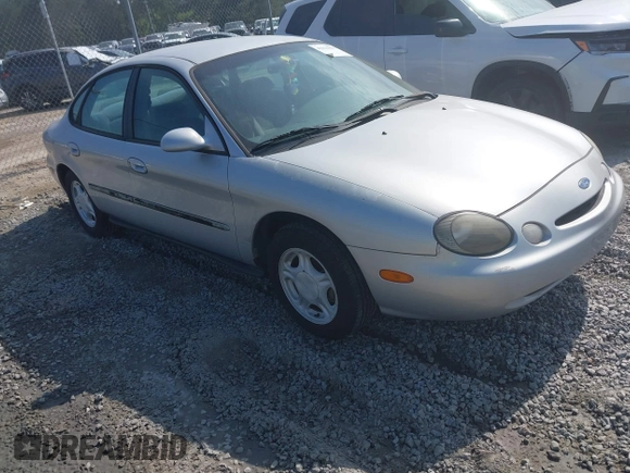 1997 Ford Taurus GL z VIN 1FALP52U9VA295404, wystawiony jako IAAI lot #42234839 z przebiegiem 163 080 mil mil oraz . Historia ofert i sprzedaży dostępna na DreamBid. Obrazek 1.