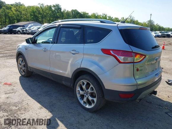 2016 Ford Escape Titanium with VIN 1FMCU9J97GUB91966, listed as a IAAI auction lot 42378829 with 121,218 mi miles and . Bid and sale history available at DreamBid. Image 3.