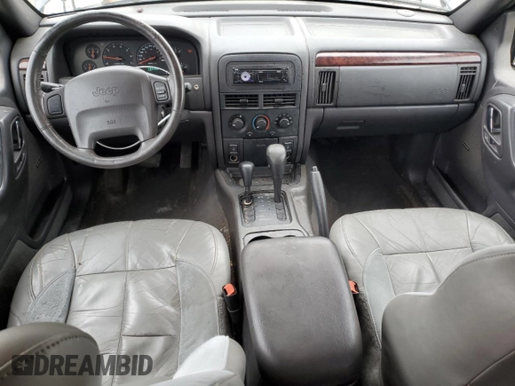 2000 Jeep Grand Cherokee Laredo with VIN 1J4GW48S2YC336733, listed as a Copart auction lot 54553315 with 284,402 mi miles and Non repairable. Bid and sale history available at DreamBid. Image 8.