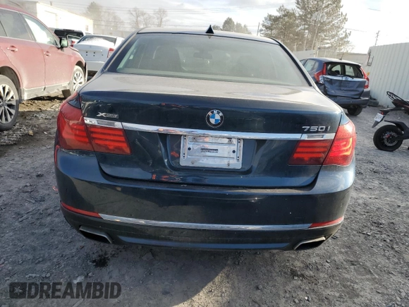 2013 BMW 7 Series 750i xDrive with VIN WBAYB6C50DD223786, listed as a Copart auction lot 87579345 with 143,523 mi miles and Salvage title. Bid and sale history available at DreamBid. Image 6.