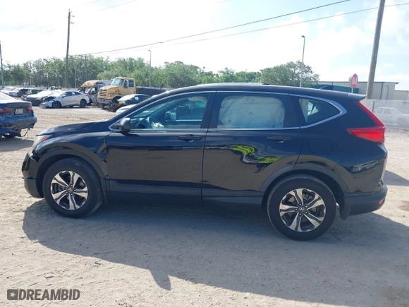 2017 Honda CR-V LX with VIN 7FARW5H33HE001050, listed as a IAAI auction lot 41944571 with 61,159 mi miles. Bid and sale history available at carsss.com. Image 14.