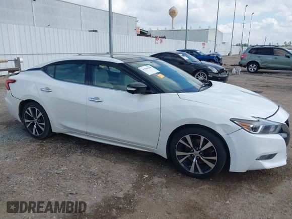 2016 Nissan Maxima SL z VIN 1N4AA6AP8GC403657, wystawiony jako IAAI lot #41506188 z przebiegiem 97 935 mil mil oraz . Historia ofert i sprzedaży dostępna na DreamBid. Obrazek 13.
