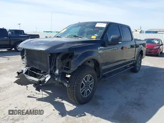 2015 Ford F-150 XL with VIN 1FTEW1CF1FFA20743, listed as a IAAI auction lot 41805237 with 149,020 mi miles. Bid and sale history available at carsss.com. Image 2.