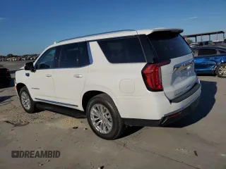 2022 GMC Yukon SLT with VIN 1GKS1BKD1NR259041, listed as a Copart auction lot 77877304 with 27,772 mi miles and Salvage Title. Bid and sale history available at carsss.com. Image 2.
