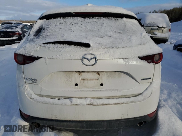 2020 Mazda CX-5 Touring z VIN JM3KFBCM4L0809644, wystawiony jako Copart lot #45048825 z przebiegiem 129 178 mil mil oraz Szkoda całkowita • Salvage title. Historia ofert i sprzedaży dostępna na DreamBid. Obrazek 6.
