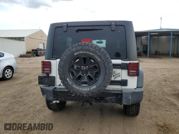 2016 Jeep Wrangler Unlimited Sport with VIN 1C4BJWDG4GL129559, listed as a Copart auction lot 57851285 with 148,022 mi miles and Salvage title. Bid and sale history available at DreamBid. Image 6.