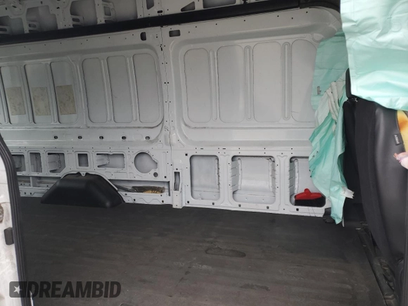 2021 Ford Transit Cargo с VIN 1FTBR3X89MKA77102, выставлен на аукционе Copart как лот 85972654 с пробегом 77 145 миль миль и Списание • Salvage title. История ставок и продаж доступна на DreamBid. Изображение 11.