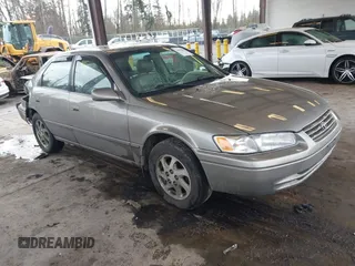 1998 Toyota Camry LE z VIN JT2BF28K1W0109514, wystawiony jako IAAI lot #41610102 z przebiegiem 161 266 mil mil oraz . Historia ofert i sprzedaży dostępna na DreamBid. Obrazek 1.