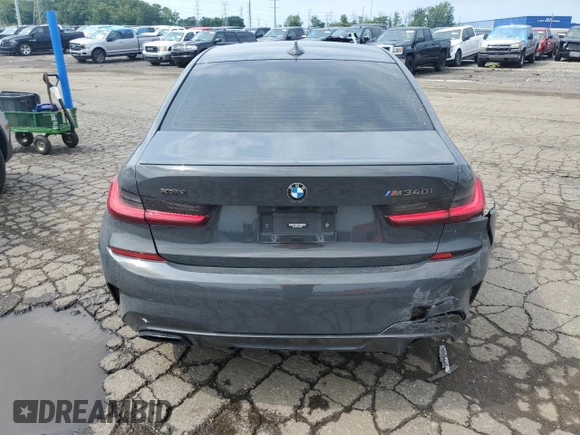 2022 BMW 3 Series M340i xDrive with VIN WBA5U9C07NFM06921, listed as a Copart auction lot 64725683 with 16,994 mi miles and . Bid and sale history available at DreamBid. Image 6.