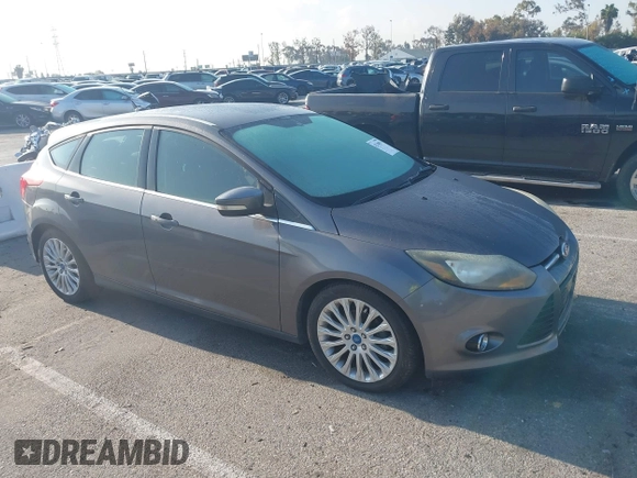 2012 Ford Focus Titanium with VIN 1FAHP3N22CL200249, listed as a IAAI auction lot 42149873 with 103,805 mi miles and . Bid and sale history available at carsss.com. Image 1.