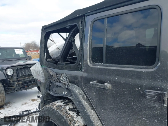 2018 Jeep Wrangler Unlimited Sport S z VIN 1C4HJXDG4JW228078, wystawiony jako IAAI lot #41381520 z przebiegiem 58 899 mil mil oraz . Historia ofert i sprzedaży dostępna na DreamBid. Obrazek 6.