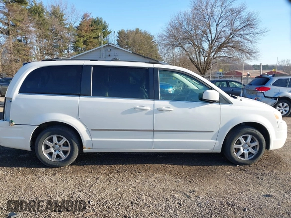 2009 Chrysler Town & Country Touring with VIN 2A8HR54179R631851, listed as a IAAI auction lot 41786165 with 126,988 mi miles and . Bid and sale history available at DreamBid. Image 14.
