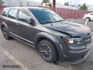2017 Dodge Journey SE with VIN 3C4PDCAB6HT707509, listed as a IAAI auction lot 41712874 with 227,965 mi miles. Bid and sale history available at carsss.com. Image 1.