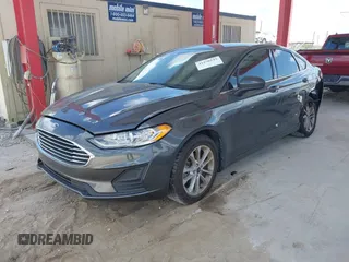 2019 Ford Fusion SE with VIN 3FA6P0HDXKR162353, listed as a IAAI auction lot 41970142 with 90,411 mi miles. Bid and sale history available at carsss.com. Image 2.