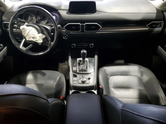 2018 Mazda CX-5 Grand Touring with VIN JM3KFADM3J0325843, listed as a Copart auction lot 87958375 with 93,577 mi miles and Salvage title. Bid and sale history available at DreamBid. Image 8.