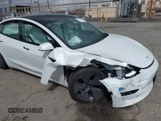 2021 Tesla Model 3 Long Range with VIN 5YJ3E1EB8MF860282, listed as a IAAI auction lot 41787008 with 49,730 mi miles and . Bid and sale history available at DreamBid. Image 6.