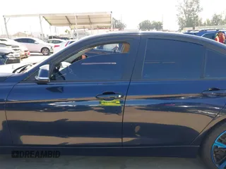 2015 BMW 3 Series 328i with VIN WBA3C1C50FK124300, listed as a IAAI auction lot 40112372 with 142,591 mi miles and . Bid and sale history available at carsss.com. Image 14.