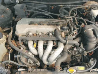 1998 Toyota Corolla VE z VIN 2T1BR18E9WC052651, wystawiony jako IAAI lot #42882032 z przebiegiem 110 251 mil mil oraz . Historia ofert i sprzedaży dostępna na DreamBid. Obrazek 15.