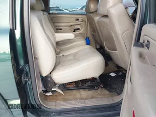 2003 Chevrolet Suburban LT z VIN 3GNFK16Z63G166885, wystawiony jako IAAI lot #41150771 z przebiegiem 290 630 mil mil oraz . Historia ofert i sprzedaży dostępna na DreamBid. Obrazek 8.