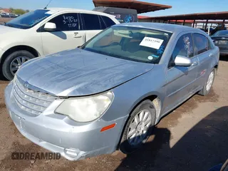 2008 Chrysler Sebring LX with VIN 1C3LC46K28N225737, listed as a IAAI auction lot 41817390 with 165,533 mi miles and . Bid and sale history available at DreamBid. Image 2.