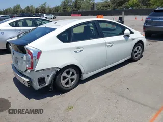 2015 Toyota Prius Four with VIN JTDKN3DU9F0475163, listed as a IAAI auction lot 42630828 with 158,095 mi miles and . Bid and sale history available at DreamBid. Image 4.
