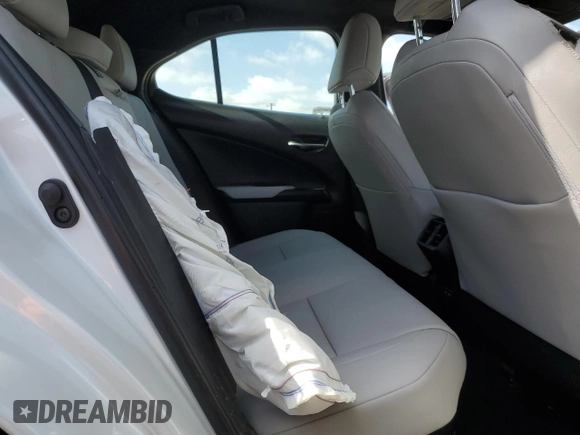2024 Lexus UX with VIN JTHX6JBHXR2168962, listed as a Copart auction lot 51153075 with 7,080 mi miles and Salvage Title. Bid and sale history available at carsss.com. Image 11.