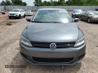 2014 Volkswagen Jetta TDI w/Premium with VIN 3VWLL7AJ7EM313598, listed as a Copart auction lot 54905595 with 162,036 mi miles and Salvage title. Bid and sale history available at DreamBid. Image 5.