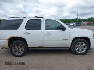 2011 GMC Yukon SLT z VIN 1GKS2CE07BR207565, wystawiony jako IAAI lot #42542596 z przebiegiem 217 759 mil mil oraz . Historia ofert i sprzedaży dostępna na DreamBid. Obrazek 14.