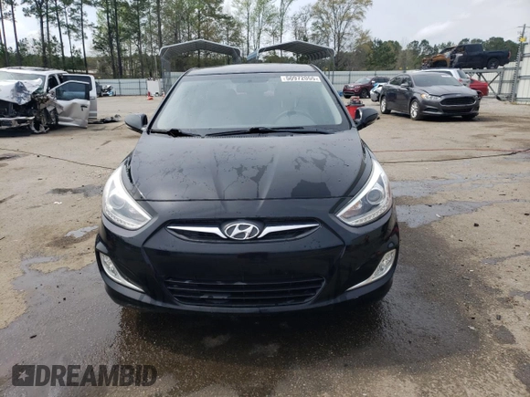 2014 Hyundai Accent SE z VIN KMHCU5AE2EU164130, wystawiony jako Copart lot #50972055 z przebiegiem 113 834 mil mil oraz Szkoda całkowita • Salvage title. Historia ofert i sprzedaży dostępna na DreamBid. Obrazek 5.