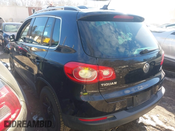 2011 Volkswagen Tiguan SE with VIN WVGBV7AXXBW511550, listed as a IAAI auction lot 41630804 with 99,967 mi miles and . Bid and sale history available at DreamBid. Image 3.