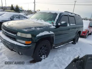 2003 Chevrolet Suburban LT z VIN 3GNFK16Z63G166885, wystawiony jako IAAI lot #41150771 z przebiegiem 290 630 mil mil oraz . Historia ofert i sprzedaży dostępna na DreamBid. Obrazek 2.