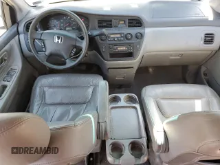 2004 Honda Odyssey EX-L with VIN 5FNRL18994B117140, listed as a Copart auction lot 49677635 with 247,237 mi miles and Salvage Title. Bid and sale history available at DreamBid. Image 8.