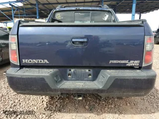 2014 Honda Ridgeline RTL with VIN 5FPYK1F58EB001953, listed as a Copart auction lot 49433875 with 191,094 mi miles and Salvage Title. Bid and sale history available at carsss.com. Image 6.