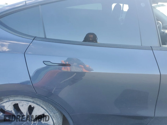 2022 Tesla Model Y Performance with VIN 7SAYGDEF8NF384270, listed as a Copart auction lot 56718215 with Not provided miles and Salvage title. Bid and sale history available at DreamBid. Image 11.