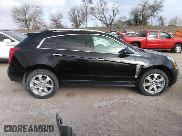 2016 Cadillac SRX Performance Collection z VIN 3GYFNCE32GS505552, wystawiony jako IAAI lot #40949642 z przebiegiem 143 343 mil mil oraz . Historia ofert i sprzedaży dostępna na DreamBid. Obrazek 13.