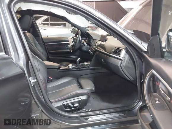 2018 BMW 3 Series 330i xDrive with VIN WBA8D9C51JEM34061, listed as a IAAI auction lot 42682318 with 65,245 mi miles and . Bid and sale history available at DreamBid. Image 5.